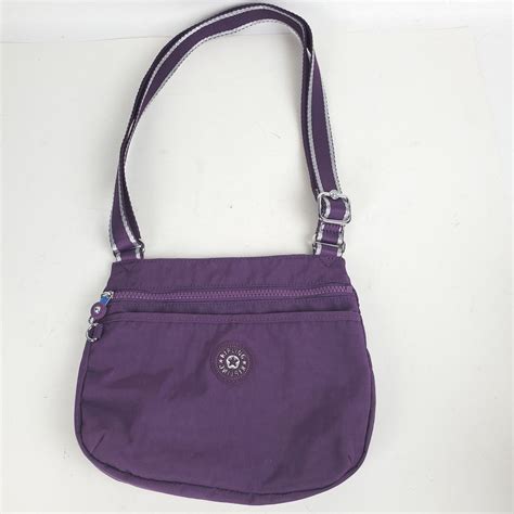 kipling live light purses.